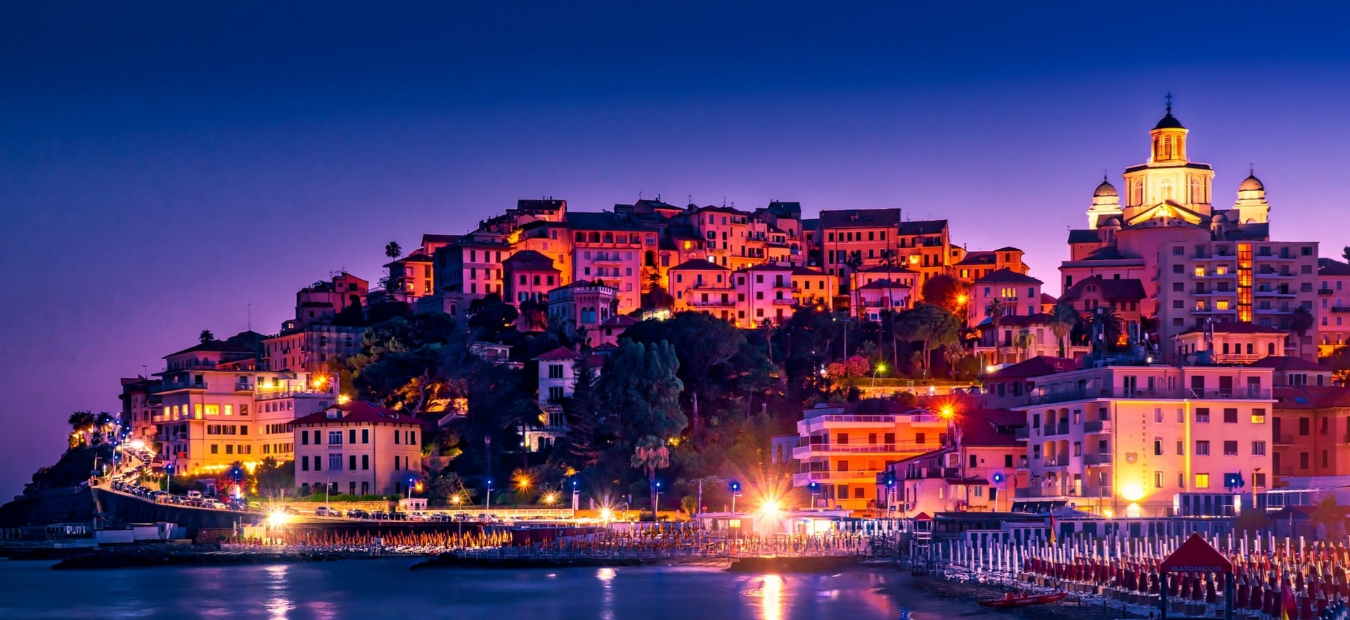 imperia-lit-up-at-sunset-hero-shot-for-exploring-the-italian-riviera
